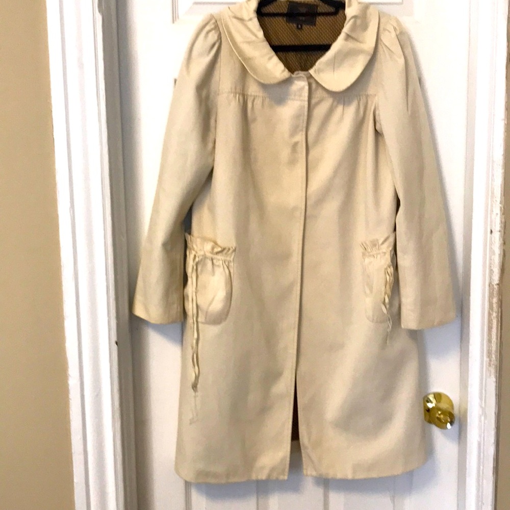 Tocca, beautiful and elegant light coat for women.